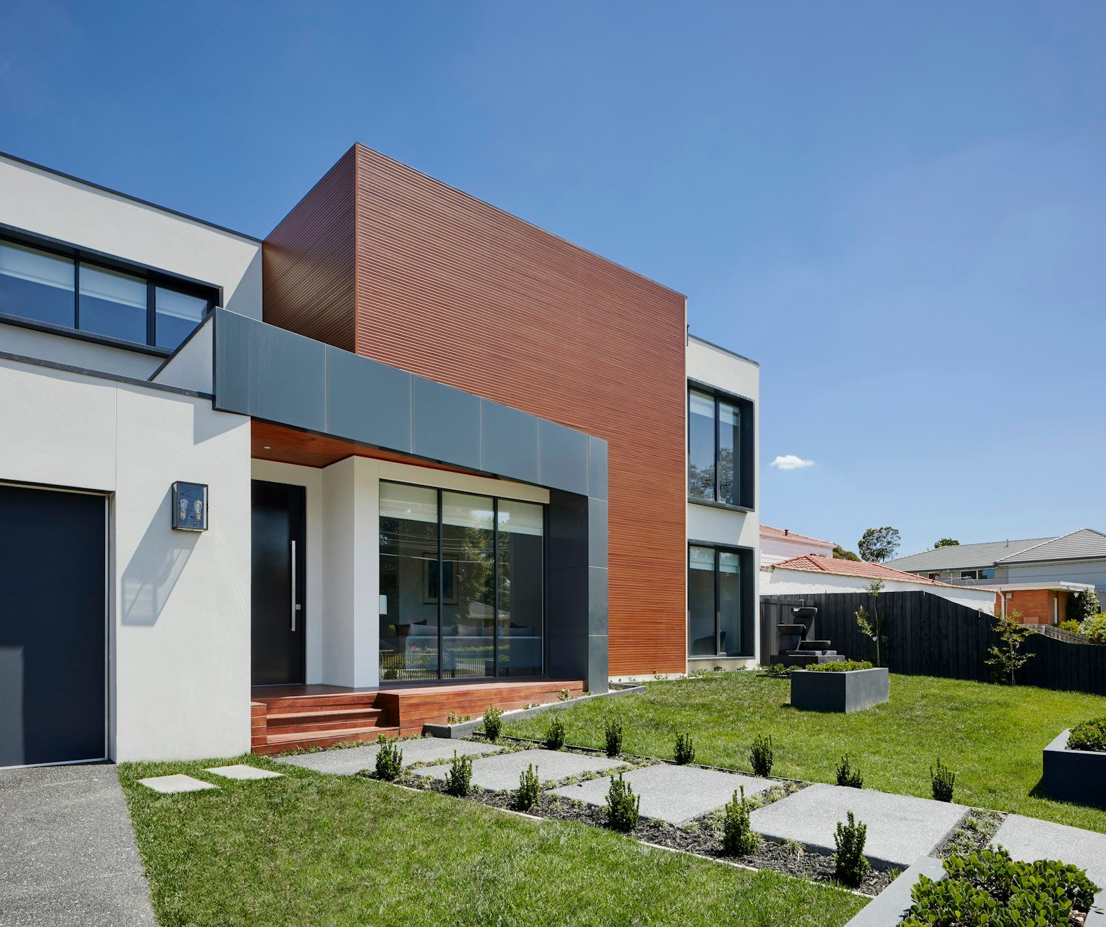 The west facade of Casa Lumen, with the guest wing beyond